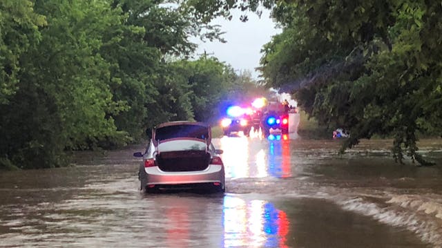Oklahoma City, OK, firefighters rescued motorists from several vehicles after they became stranded in high water caused by flooding from heavy rainfall.