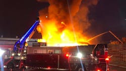 Stockton firefighters battled a five-alarm blaze at a lumberyard early Tuesday, only three weeks after tackling a massive blaze at another industrial lumberyard in the city.
