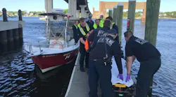 Three boaters were rescued from cold water Wednesday by Tiverton, MA, firefighters after choppy waves capsized their powerboat.