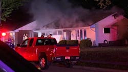 A Vandalia, OH, firefighter suffered smoke inhalation battling a house fire early Wednesday.