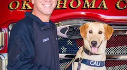 Cali and her Oklahoma City, OK, Fire Department handler, Lt. Mark Edwards.
