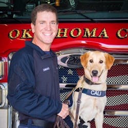 Cali and her Oklahoma City, OK, Fire Department handler, Lt. Mark Edwards.