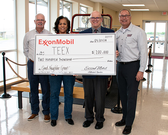 Pictured are (L to R): Chief Robert Moore, TEEX-ESTI Director; Johnita Jones &lsquo;83, Vice President &ndash; Southern Operations Manager, ExxonMobil Pipeline Company; Charles Todd, TEEX Chief Financial Officer; David Coatney, TEEX Agency Director.