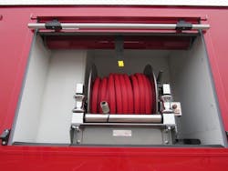 To create space for a hose reel, Midwest Fire created a notched space in a water tank to accommodate the equipment.