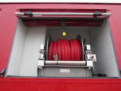 To create space for a hose reel, Midwest Fire created a notched space in a water tank to accommodate the equipment. To create space for a hose reel, Midwest Fire created a notched space in a water tank to accommodate the equipment.