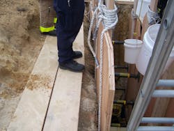 8. On the spoil pile side of the trench, 2” x 12” boards are used as ground pads until the spoil pile is moved further back from the trench. As the distance from the trench increases, more boards and ground pads could be added. 8. On the spoil pile side of the trench, 2” x 12” boards are used as ground pads until the spoil pile is moved further back from the trench. As the distance from the trench increases, more boards and ground pads could be added.