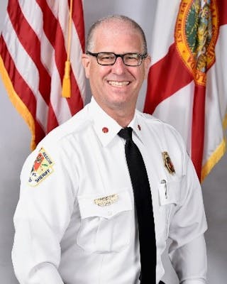 Todd LeDuc, former assistant fire chief, will oversee firefighter education outreach for Life Scan Wellness Centers.