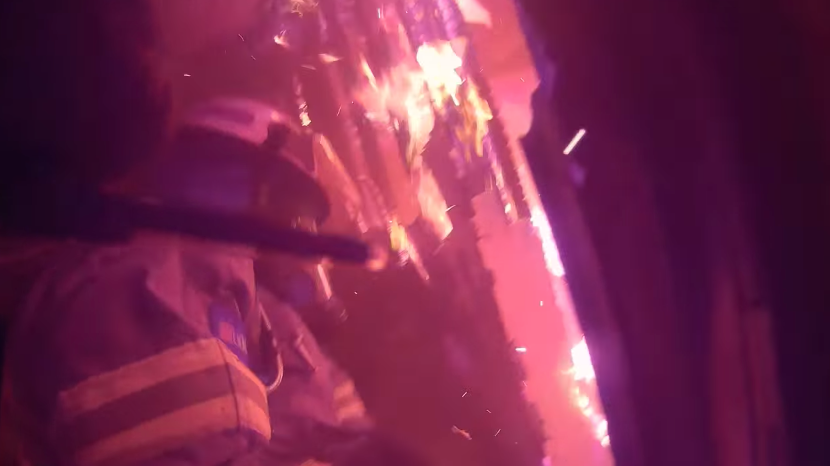 Raw video shows Cintronelle, AL, firefighters attacking the flames engulfing a burning mobile home early Sunday.