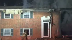 An East Point, GA, firefighter suffered from heat exhaustion and was hospitalized following a house fire early Saturday that also sent a resident to the hospital and left two dogs dead.
