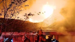 A Forest Hills, PA, firefighter suffered an eye injury Monday night while battling a blaze that damaged three homes.