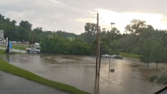 Storms caused Gravois Creek in Crestwood, MO, to overflow its banks Wednesday, creating a flash flood that stranded 40 visitors to Whitecliff Park.