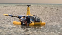 The pilot of a Key West, FL, tourist helicopter and two passengers suffered minor injuries after the aircraft had to make an emergency landing in the ocean Monday night.