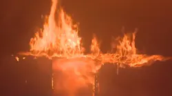 Around 100 firefighters responded to a two-story office building blaze on the Las Vegas Strip early Monday.