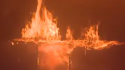 Around 100 firefighters responded to a two-story office building blaze on the Las Vegas Strip early Monday.