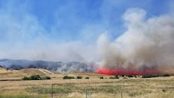 Equipment used to harvest hay is being blamed for sparking the McMillan wildfire last week, which burned through more than 1,700 acres near Shandon, CA.