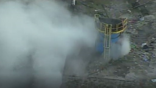 Two Miami-Dade firefighters were injured battling a blaze at a recycling facility in Doral early Friday.