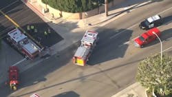 Three Orange, CA, firefighters were injured in a collision between a fire apparatus and a motorcycle that killed the motorcyclist Wednesday.