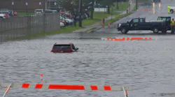Oswego, NY, firefighters rescued at least one person who was trapped in a Jeep along a flooded water.