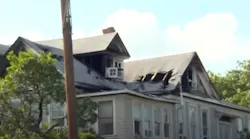 About 100 San Antonio firefighters battled a blaze Sunday at a three-story apartment building in the Monte Vista neighborhood.