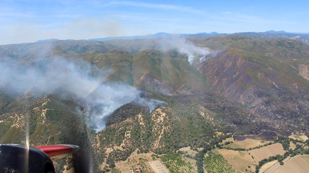 Two firefighters suffered minor injuries battling the Sand Fire, California's largest wildfire so far this season, in Yolo County.