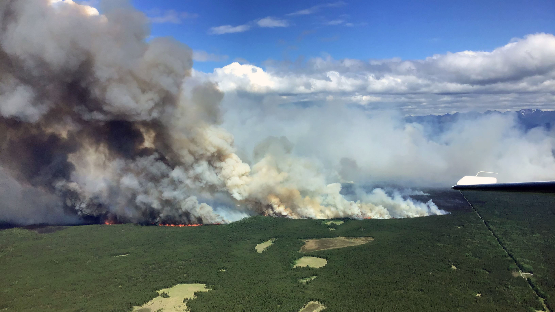 Firefighters are taking precautions to make sure Alaska's Swan Lake wildfire doesn't spread to homes and infrastructure.