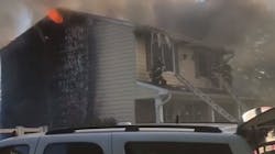 Four firefighters were injured battling a house fire Wednesday in West Islip that started from a barbecue grill on the back deck.