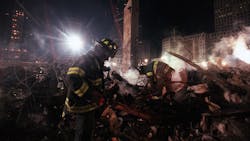 FDNY firefighters from Staten Island&apos;s Rescue 5 company search for victims in the rubble at Ground Zero in lower Manhattan in December 2001.