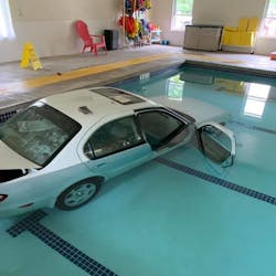 The 93-year-old woman was not hurt after driving her 2000 Infiniti into a pool at the Westlake Aquatic Center in Gravois Mills, MO.