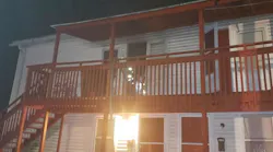 A Derby, CT, firefighter suffered minor injuries battling a second-floor blaze of a building early Monday.