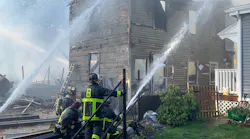 Seven Boston firefighters were hurt battling a nine-alarm blaze that spread to eight homes in the Mattapan neighborhood Saturday.