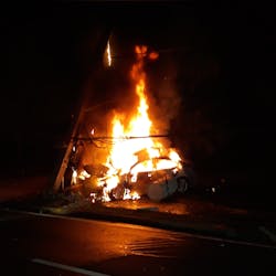 Ocala, FL, firefighters helped a trapped driver escape a burning car that caught fire after hitting a cement power pole early Thursday.