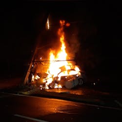 Ocala, FL, firefighters helped a trapped driver escape a burning car that caught fire after hitting a cement power pole early Thursday. Ocala, FL, firefighters helped a trapped driver escape a burning car that caught fire after hitting a cement power pole early Thursday.