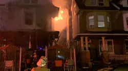 At least 12 people were injured—including a 12-year-old boy who suffered burns over 30 percent of his body—in a Philadelphia twin home fire early Tuesday.