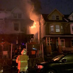 At least 12 people were injured&mdash;including a 12-year-old boy who suffered burns over 30 percent of his body&mdash;in a Philadelphia twin home fire early Tuesday.