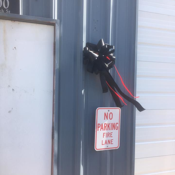A donated black ribbon hangs at the Mathiston, MS, Volunteer Fire Department following the death of acting Fire Capt. Todd Lathrip on Thursday.