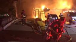 Alameda County, CA, firefighters battle a two-alarm house fire Friday night in Union City.