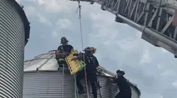 Firefighters used ropes to rescue a farmer from suffocating in a grain silo in Butler County, OH, on Thursday, May 30, 2019.