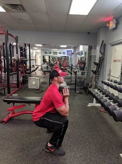Firefighters need to warm up before strength training. Here is the goblet squat, part of a light warm up.