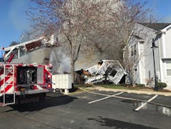 Shortly after crews entered to search for trapped residents, the end unit pulled away from the row and collapsed. Shortly after crews entered to search for trapped residents, the end unit pulled away from the row and collapsed.