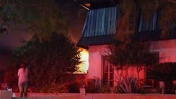 Crews battled a fire at a Castle Hills, TX, home Tuesday night, and they had to return to the residence early Wednesday when the blaze reignited.