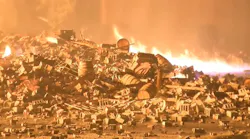 Crews from several fire departments battled a massive blaze at a Jim Beam warehouse in Woodland County, KY, that burned thousands of bourbon barrels Tuesday night.