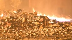 Crews from several fire departments battled a massive blaze at a Jim Beam warehouse in Woodland County, KY, that burned thousands of bourbon barrels Tuesday night.