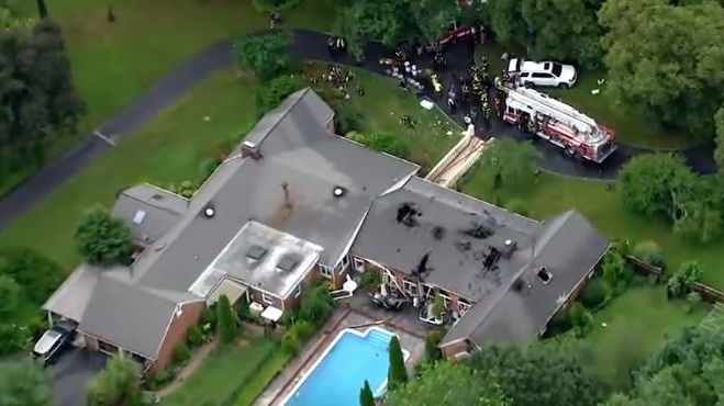More than 100 firefighters from 11 Nassau County, NY, departments put out a fire at a Muttontown mansion Tuesday.
