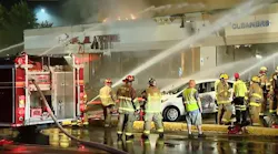Several firefighters were injured in a gas explosion that leveled a Penn Hills, PA, shopping center Monday.