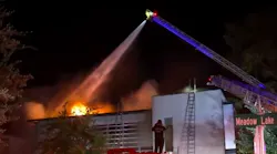 A Houston firefighter was taken to the hospital after running out of oxygen while battling a two-alarm fire Thursday night in River Oaks.