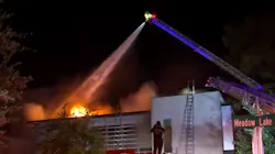 A Houston firefighter was taken to the hospital after running out of oxygen while battling a two-alarm fire Thursday night in River Oaks.