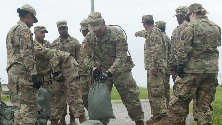 Army National Guard soldiers fill sandbags as they prepare for Tropical Storm Barry to make landfall in New Orleans on July 12, 2019.
