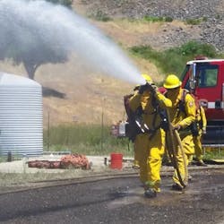 Firefighters train during CAL FIRE&apos;s seasonal academy at the Napa County Fire Department Training Grounds in Yountville, CA, in 2017.