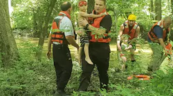 Greenville, PA, firefighters rescued four people— two adults and two young children— after their raft became entangled on a downed tree in the Shenango River on Tuesday.