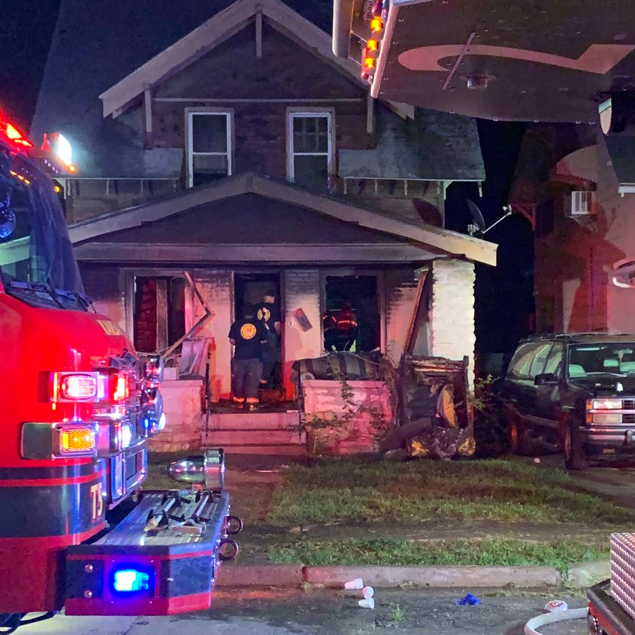 Two Kansas City, MO, firefighters suffered burns while battling a blaze authorities believe was ignited by fireworks.